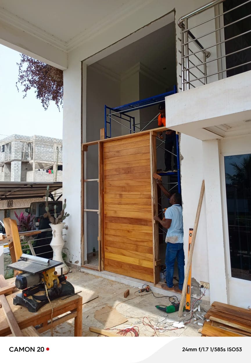Large Wood Entrance Door Installation